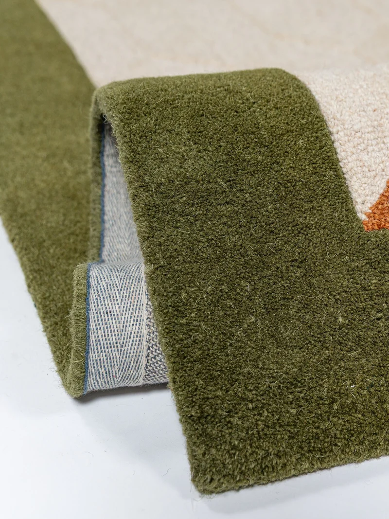Kurzflor-Wollteppich Wabenmuster · handgetuftet · 5 mm Flor, 3.250 g/m²