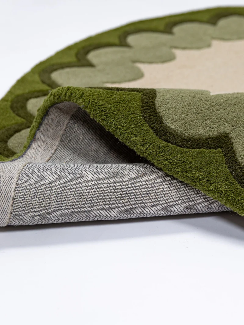 Wollteppich mit Wellenrand · handgetuftet, 5 mm Flor · 3.250 g/m²