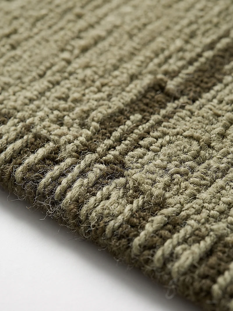 Wollteppich Bouclé-Struktur · handgetuftet · 12 mm Flor, 3.300 g/m²