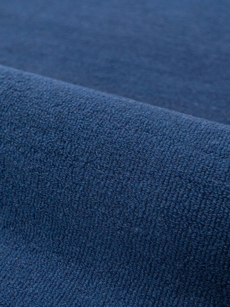 Wollteppich mit Wellenbordüre · handgetuftet · 8 mm Flor, 2.900 g/m²