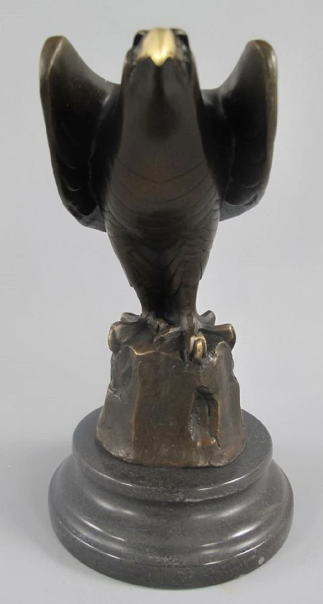 Casa Padrino Luxus Art Deco Bronze Figur Adler auf Felsen mit Marmorsockel Bronze / Gold / Schwarz 12 x 22 x H. 21 cm - Bronze Skulptur - Deko Figur - Deko Accessoires