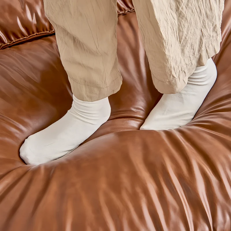 3-in-1-Schlafsofa aus geöltem Leder mit verstellbarer Rückenlehne und Seitentasche