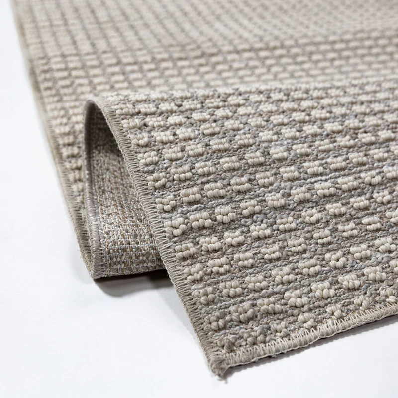 Waschbarer Kurzflor-Teppich meliert · 100 % recyceltes Polyester · Maschinell gewebt · Uni Hellgrau gepunktet
