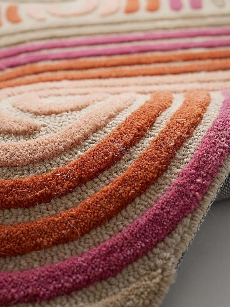 Wollteppich Spiralform · 100 % Wolle · handgetuftet