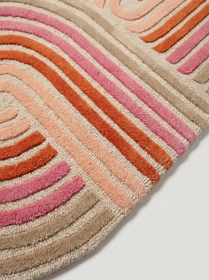 Wollteppich Spiralform · 100 % Wolle · handgetuftet