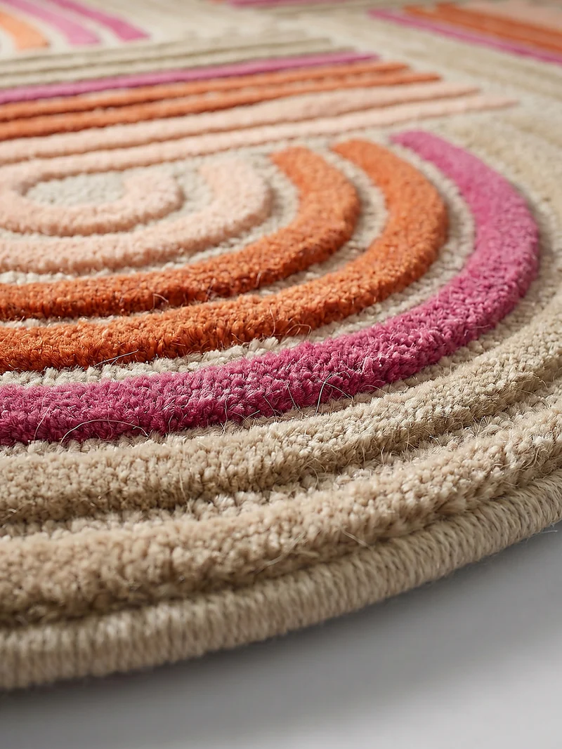 Wollteppich Spiralform · 100 % Wolle · handgetuftet