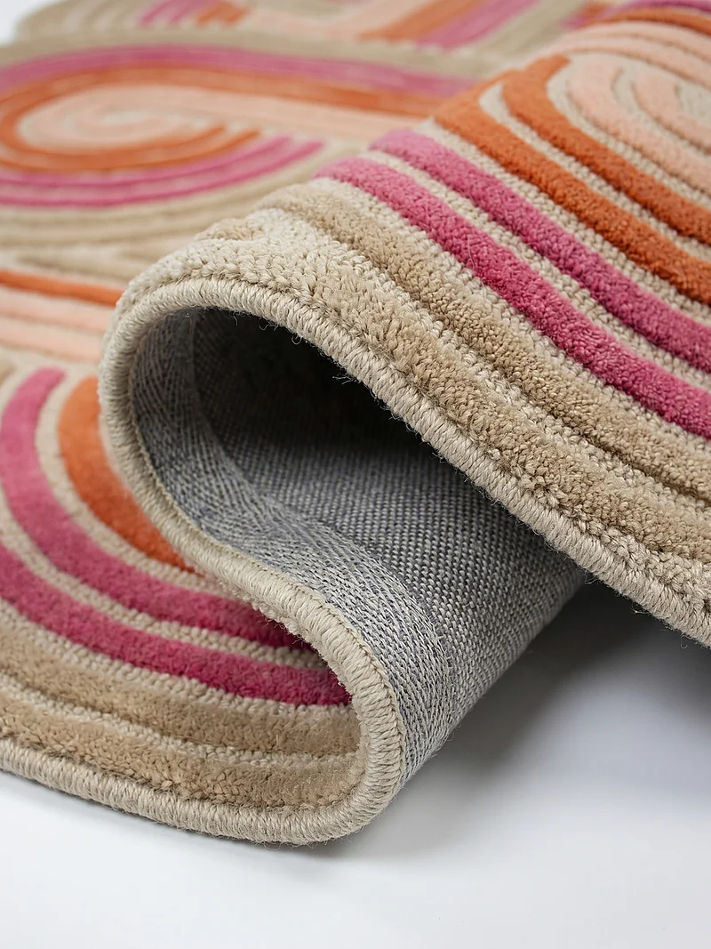 Wollteppich Spiralform · 100 % Wolle · handgetuftet
