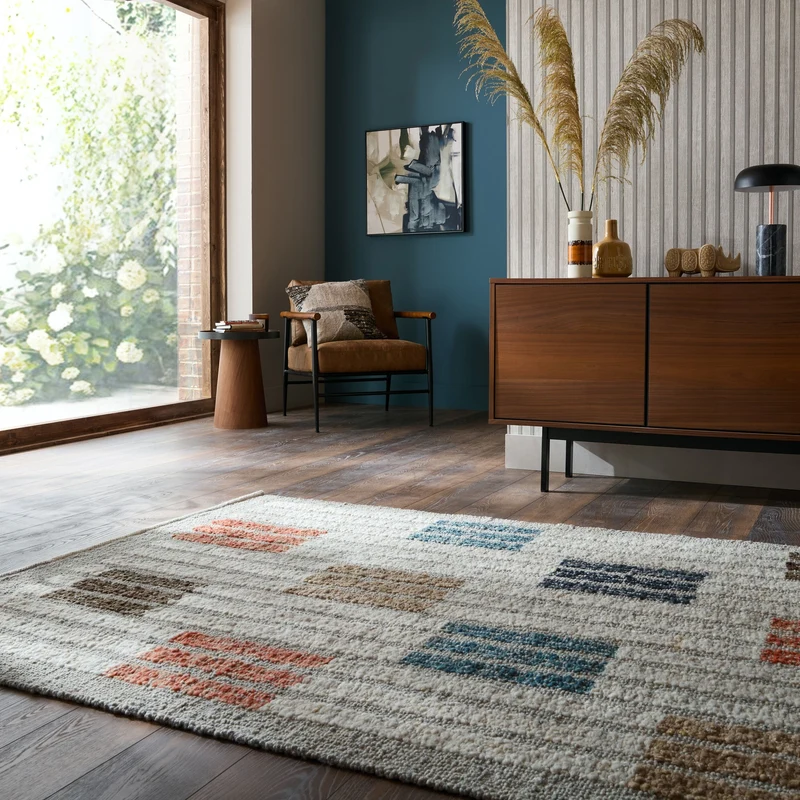 Bouclé-Teppich Blockmuster · 58 % Wolle · flach strukturiert