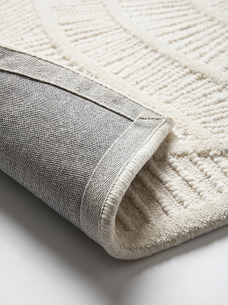 Wollteppich Wellenrelief · 80 % Wollanteil · 14 mm Mittelflor