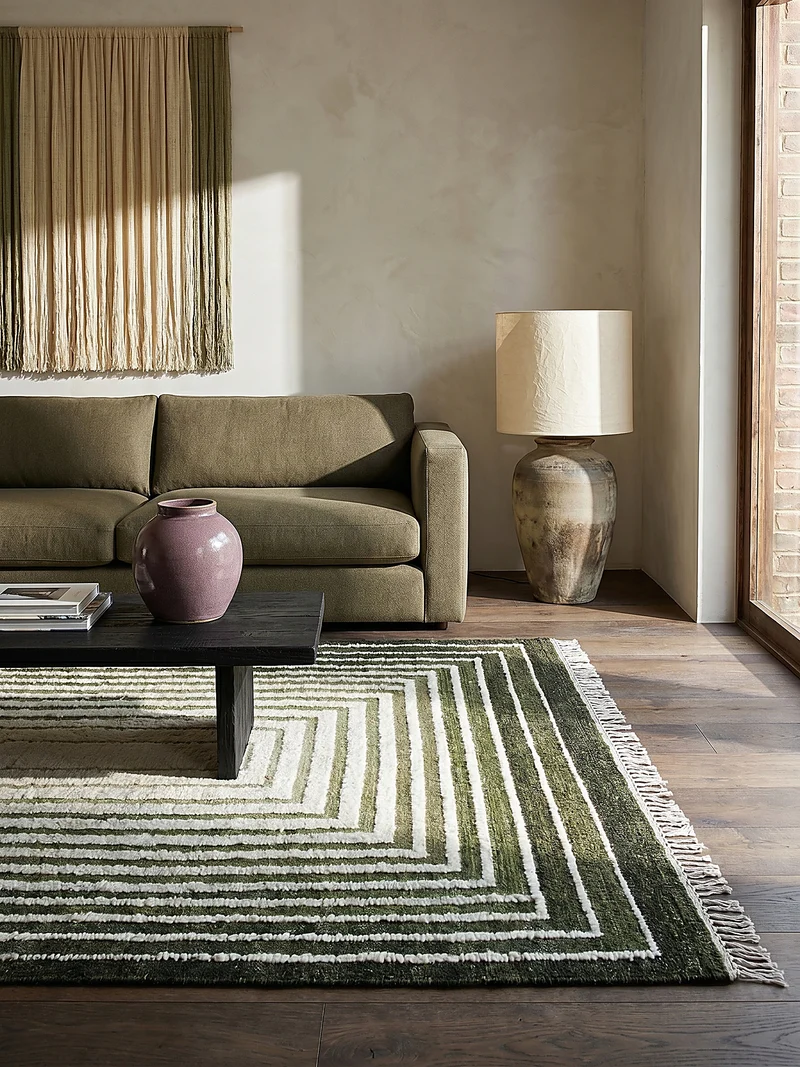 Flachgewebe-Teppich Bouclé-Frame · 74 % Wollanteil · handgewebt mit Fransen