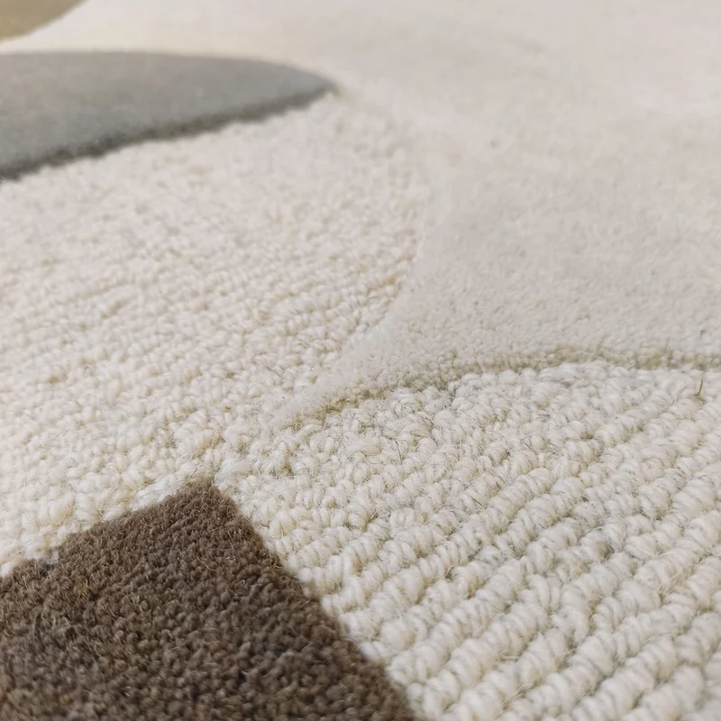 Wollteppich mit Rahmenmotiv · Wellenkante · 12 mm Flor