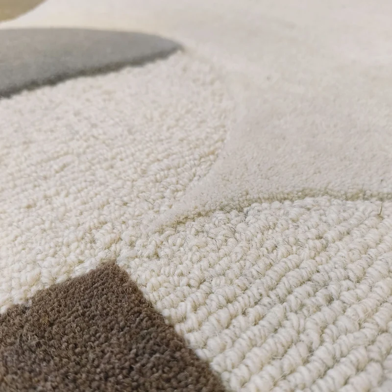 Wollteppich mit Rahmenmotiv · Wellenkante · 12 mm Flor