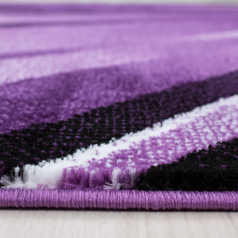 Kurzflor-Teppich Schwunglinien – Waschbar | Dynamisches Wellendesign | Heatset-Veredelung für Wolloptik