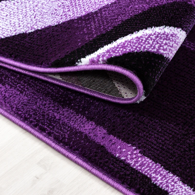 Kurzflor-Teppich Schwunglinien – Waschbar | Dynamisches Wellendesign | Heatset-Veredelung für Wolloptik