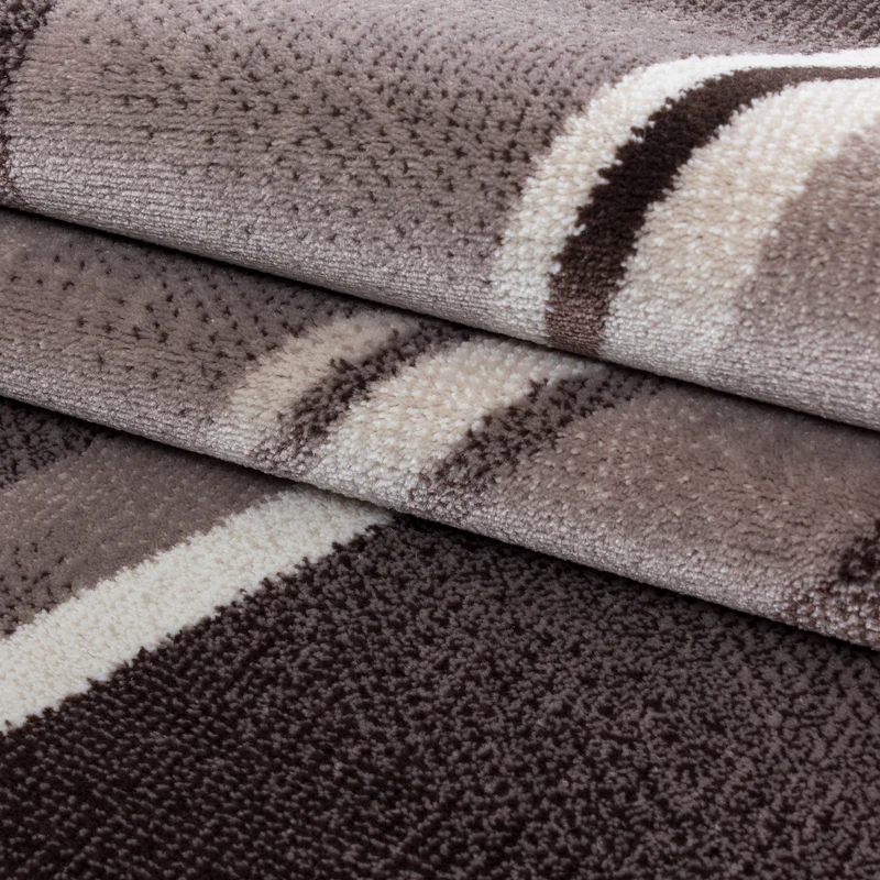 Kurzflor-Teppich Schwunglinien – Waschbar | Dynamisches Wellendesign | Heatset-Veredelung für Wolloptik