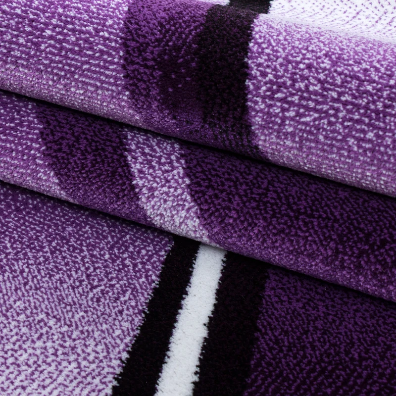Kurzflor-Teppich Schwunglinien – Waschbar | Dynamisches Wellendesign | Heatset-Veredelung für Wolloptik