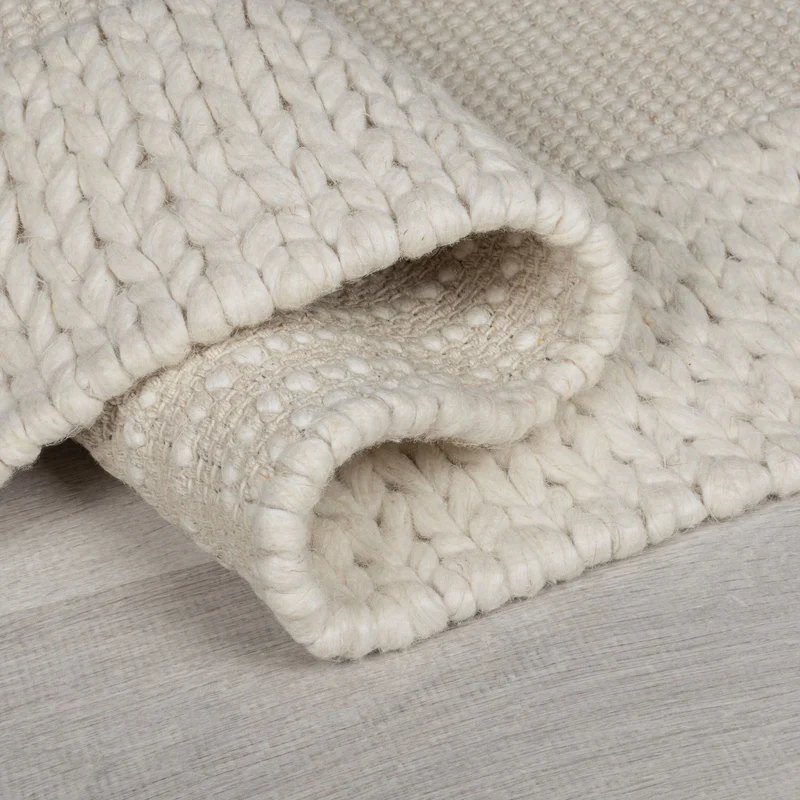 Wollteppich Strickstruktur · 69-78 % Wollanteil · 6 mm Kurzflor