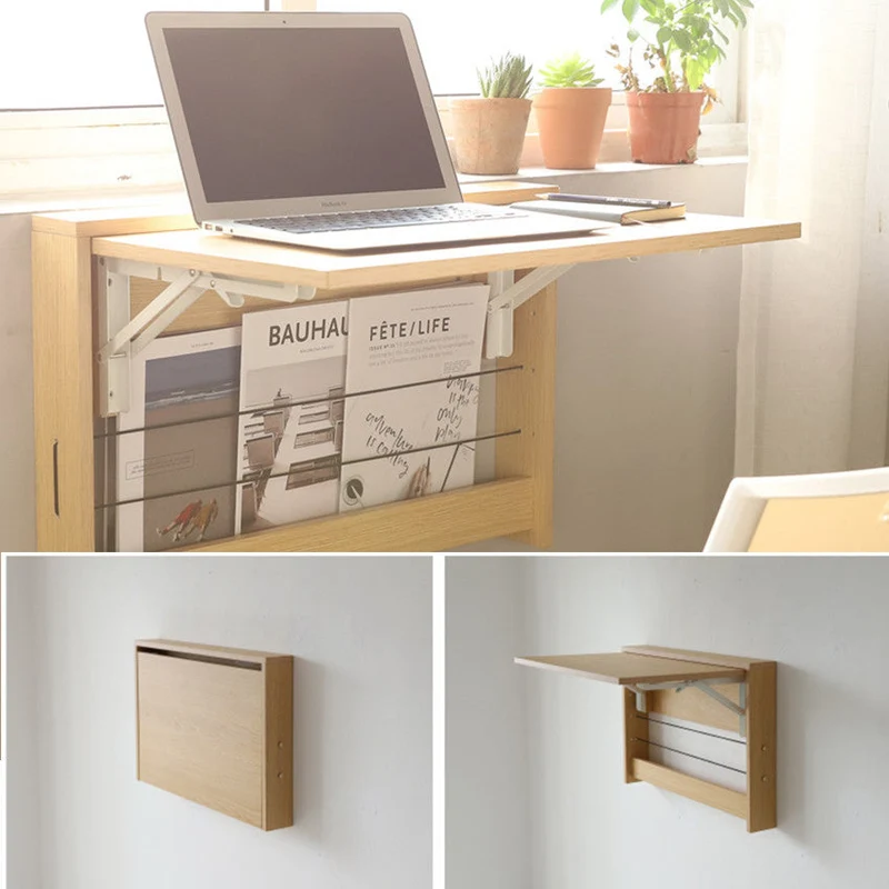 An der Wand befestigter faltbarer Schreibtisch mit Lagerregal
