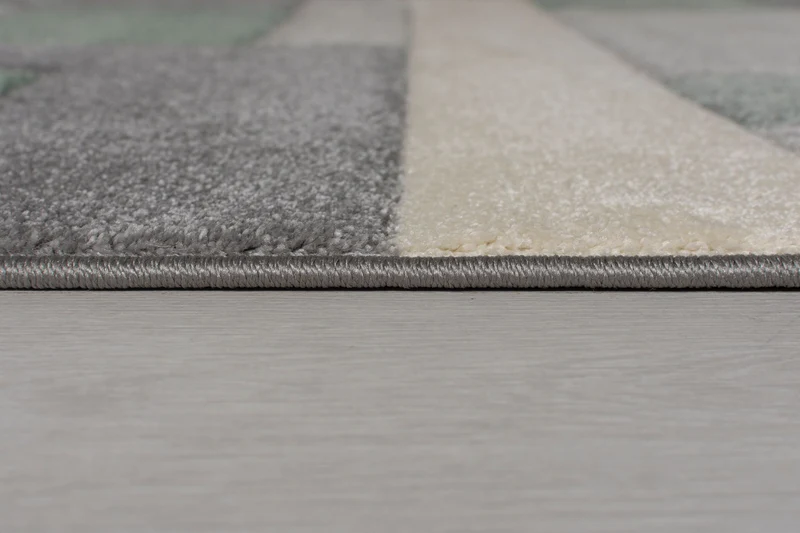 Teppich geometrisch 3D-Effekt handgearbeitet CLARA