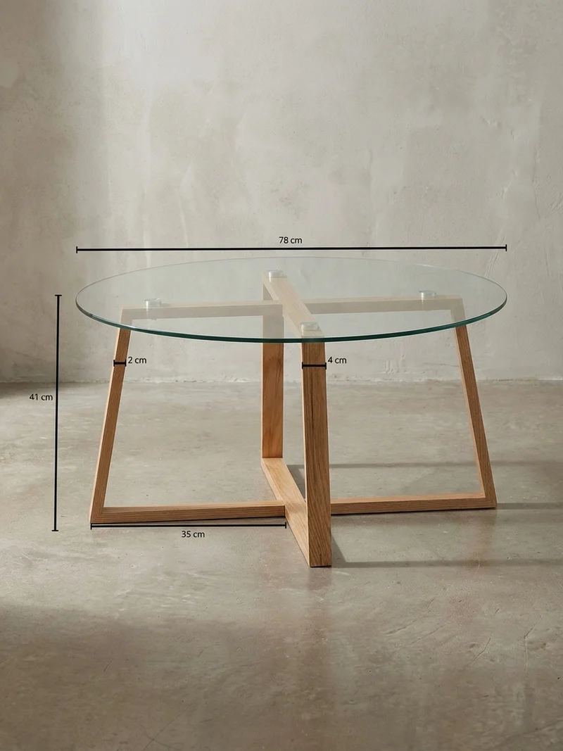 Couchtisch in Eiche mit transparenter Glasplatte und überkreuztem Gestell, modernes Design