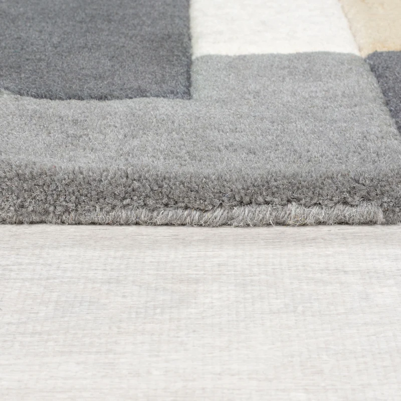 Wollteppich Cut-Out-Geometrie · 100 % Wolle · 10 mm Kurzflor