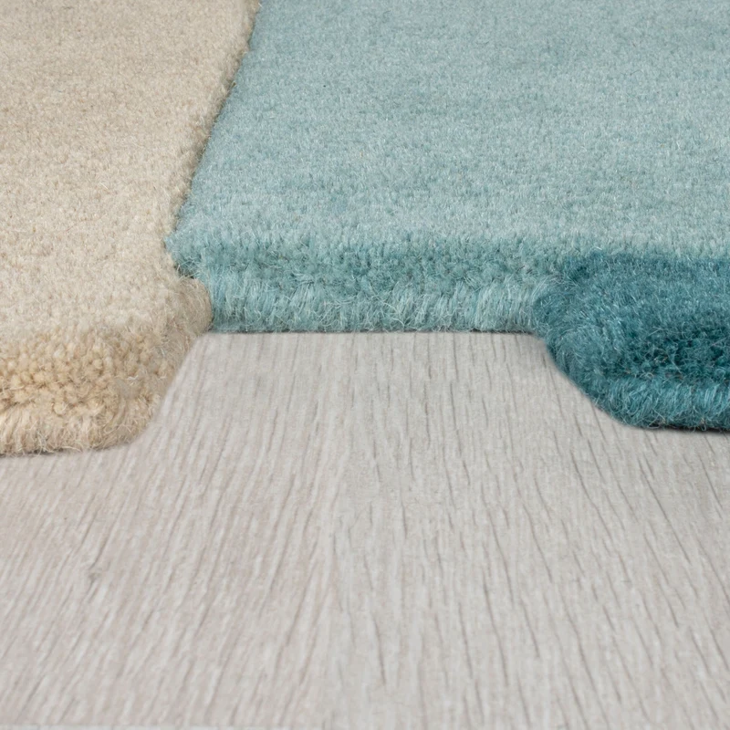 Wollteppich Cut-Out-Geometrie · 100 % Wolle · 10 mm Kurzflor