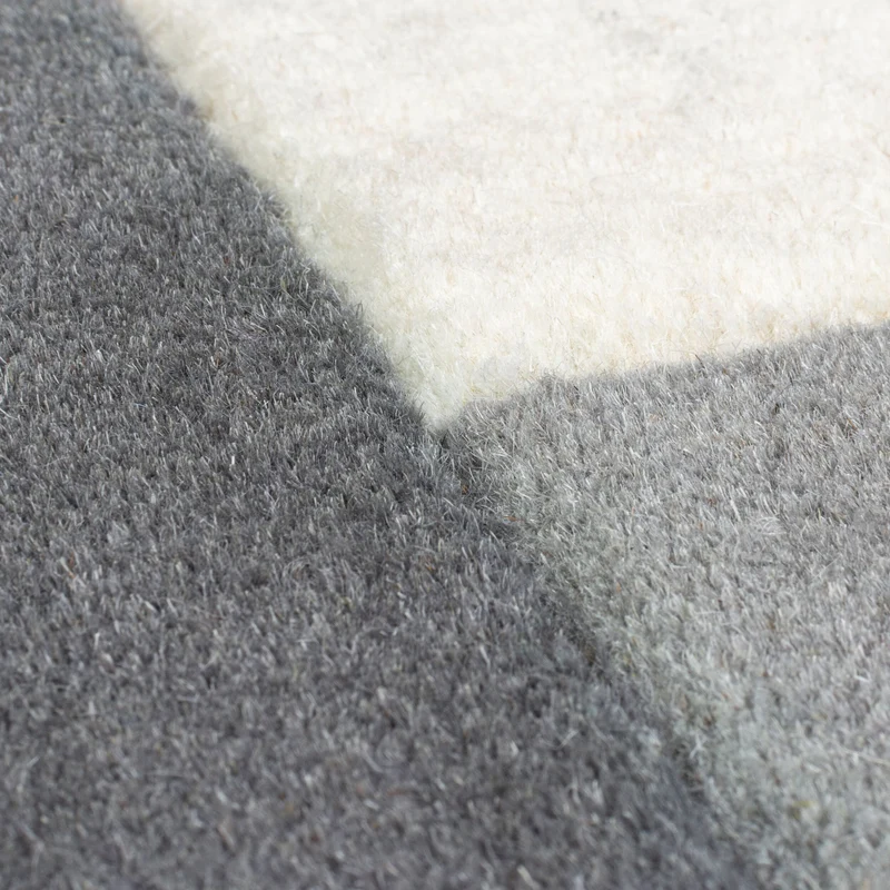 Wollteppich Cut-Out-Geometrie · 100 % Wolle · 10 mm Kurzflor