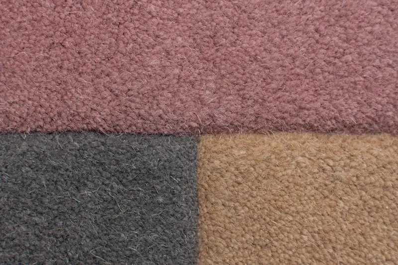 Wollteppich Cut-Out-Geometrie · 100 % Wolle · 10 mm Kurzflor