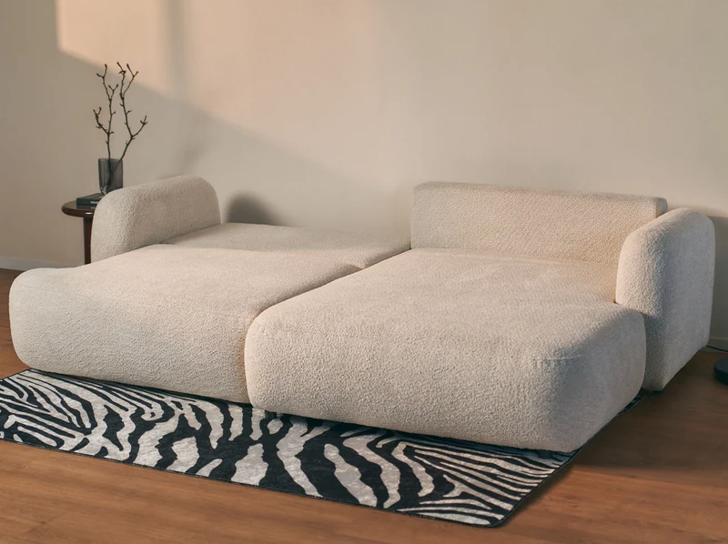Ecksofa mit Schlaffunktion Tvoya, L-förmig, rechtsseitig, hellbeige Bouclé
