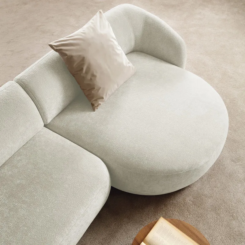 Modulares Ecksofa Bommo L-förmig mit Pouf, rechtsseitig, cremefarbenes Chenille