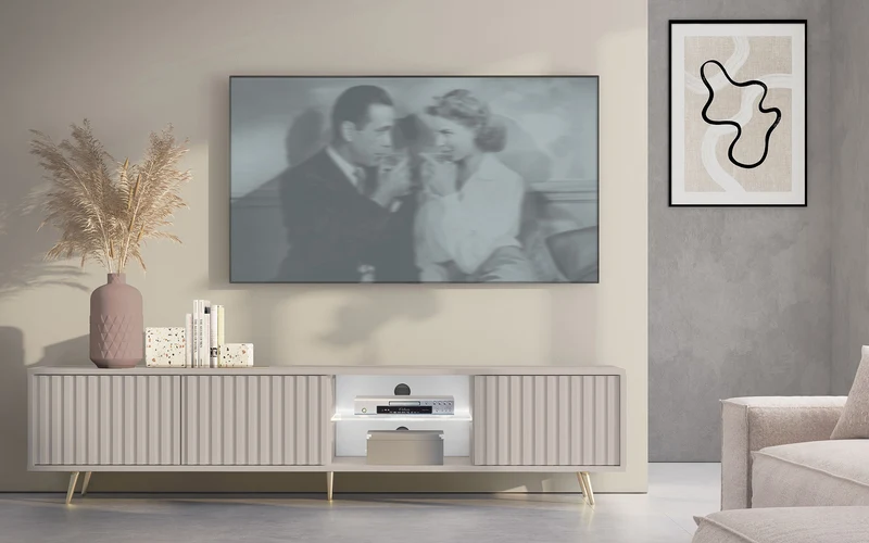 Drehtüriger TV-Schrank Bello mit Lamellenfronten und einer Glasablage mit LED-Beleuchtung, 175 cm, Kaschmir auf goldenen Beinen