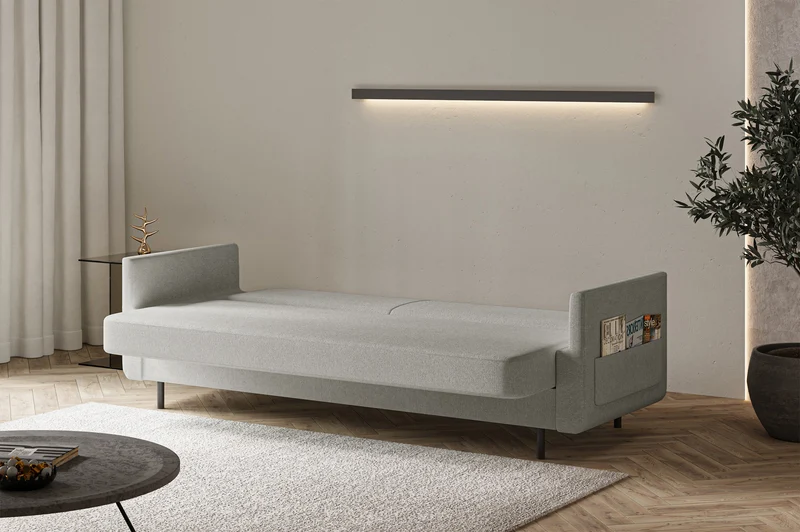 Dreisitziges ausklappbares Sofa Ovelio in hellgrauem, hydrophobem Chenille-Stoff