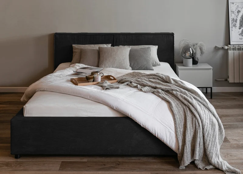 Polsterbett 140x200 cm Farese mit Stauraum und Gasdruckfeder, schwarz Cord