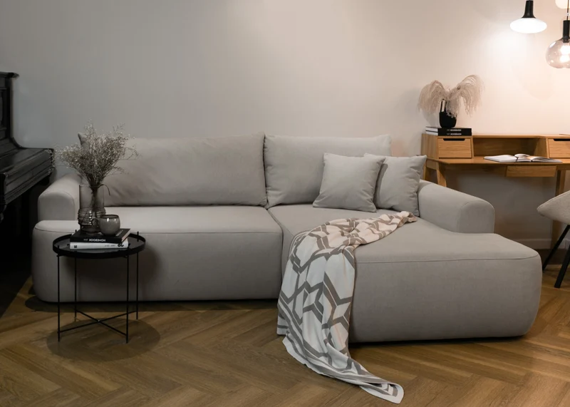 Ecksofa mit Schlafunktion Ovo, L-förmig, grau, Samt, mit Stauraum, aus pflegeleichtem Stoff, rechtsseitig