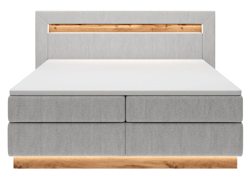 Kontinentales Bett Oski 140x200 cm mit Topper und Beleuchtung, hellgrauer Samt
