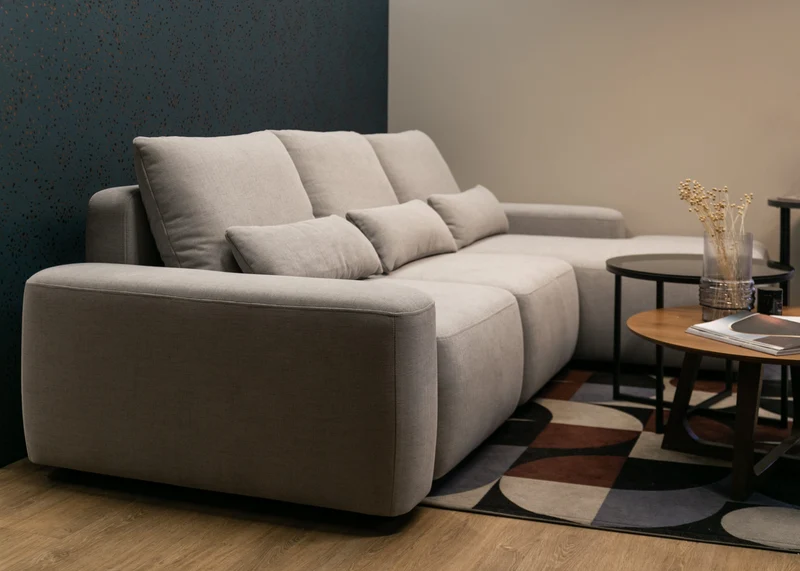 Ecksofa mit Schlaffunktion Carnos, L-förmig, mit zusätzlichen Lendenkissen, grau, hydrophober Chenille-Stoff, rechtsseitig