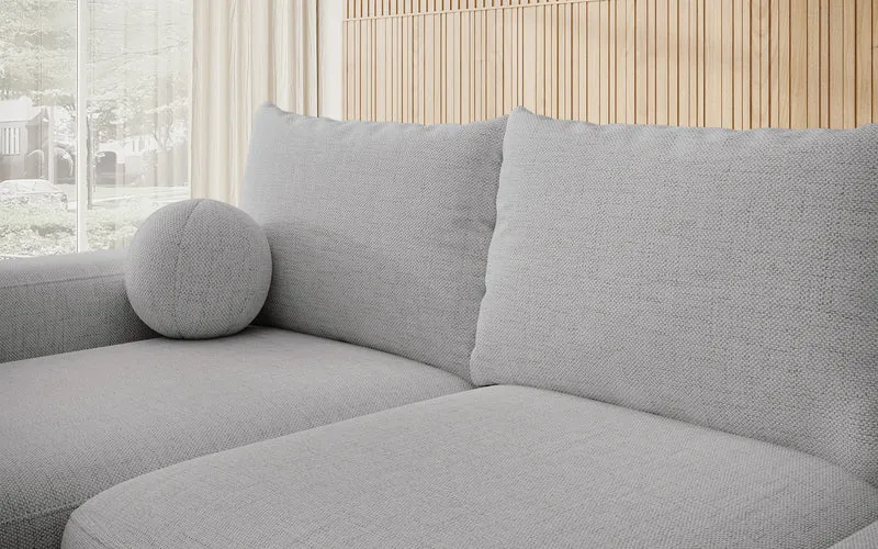 Ecksofa mit Schlaffunktion Carnos L-förmig mit Ball, einzelne Kissen, grauer hydrophober Chenille, linksseitig