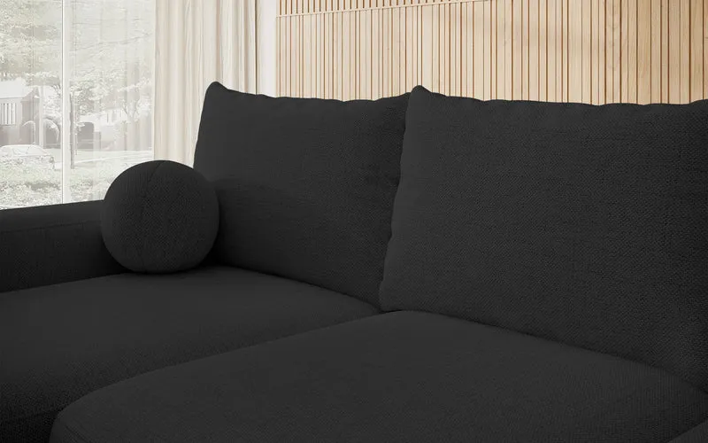 Ecksofa mit Schlafunktion Carnos L-förmig mit Ball, einzelne Kissen, schwarzer hydrophober Chenille, linksseitig