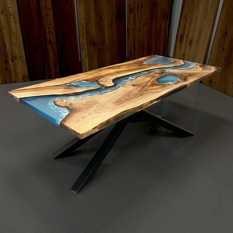 Epoxidharz Tisch aus Nussbaum hellblau mit Wellenoptik | Modell Hegau