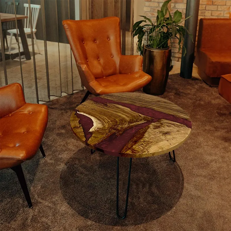 Couchtisch rund aus Nussbaum mit Epoxidharz weinrot | Modell Hegauvulkan