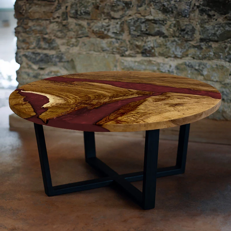 Couchtisch rund aus Nussbaum mit Epoxidharz weinrot | Modell Hegauvulkan