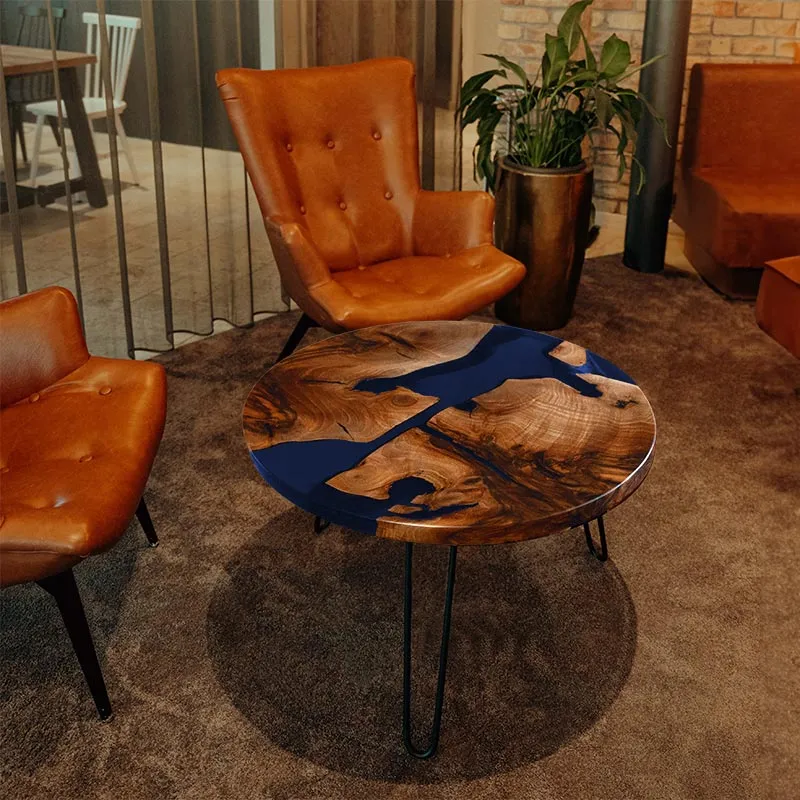 Couchtisch rund aus Nussbaum I Epoxidharz blau | Modell Schluchsee