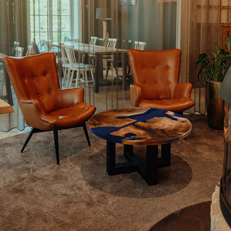 Couchtisch rund aus Nussbaum I Epoxidharz blau | Modell Schluchsee