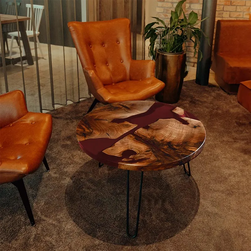 Couchtisch rund aus Nussbaum I Epoxidharz rot | Modell Schluchsee