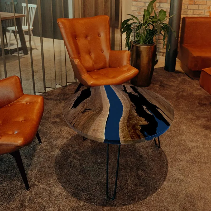 Couchtisch Nussbaum rund mit Epoxidharz maritim blau | Modell Gletschersee