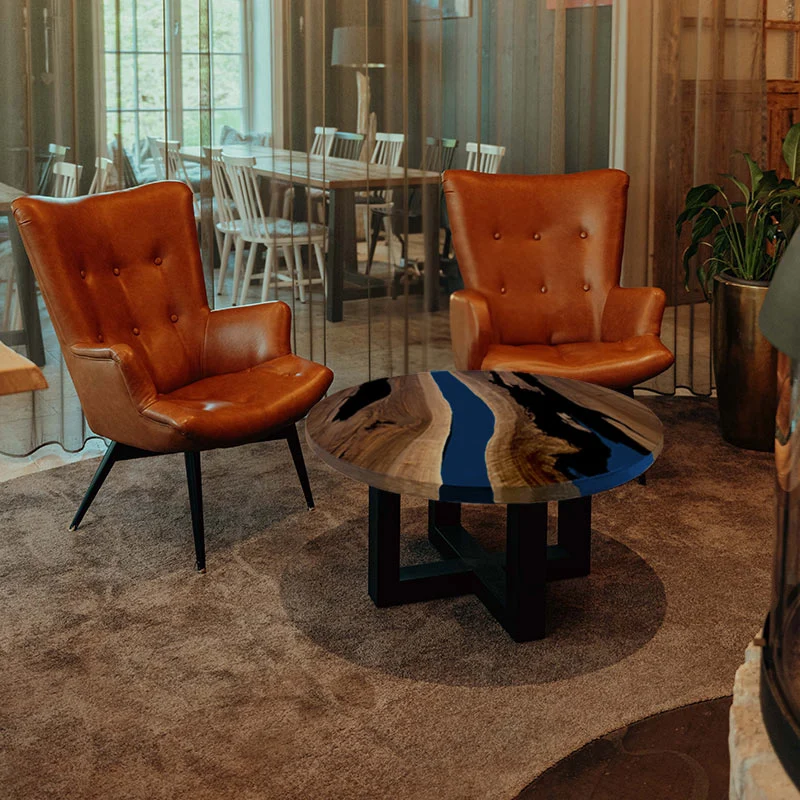 Couchtisch Nussbaum rund mit Epoxidharz maritim blau | Modell Gletschersee