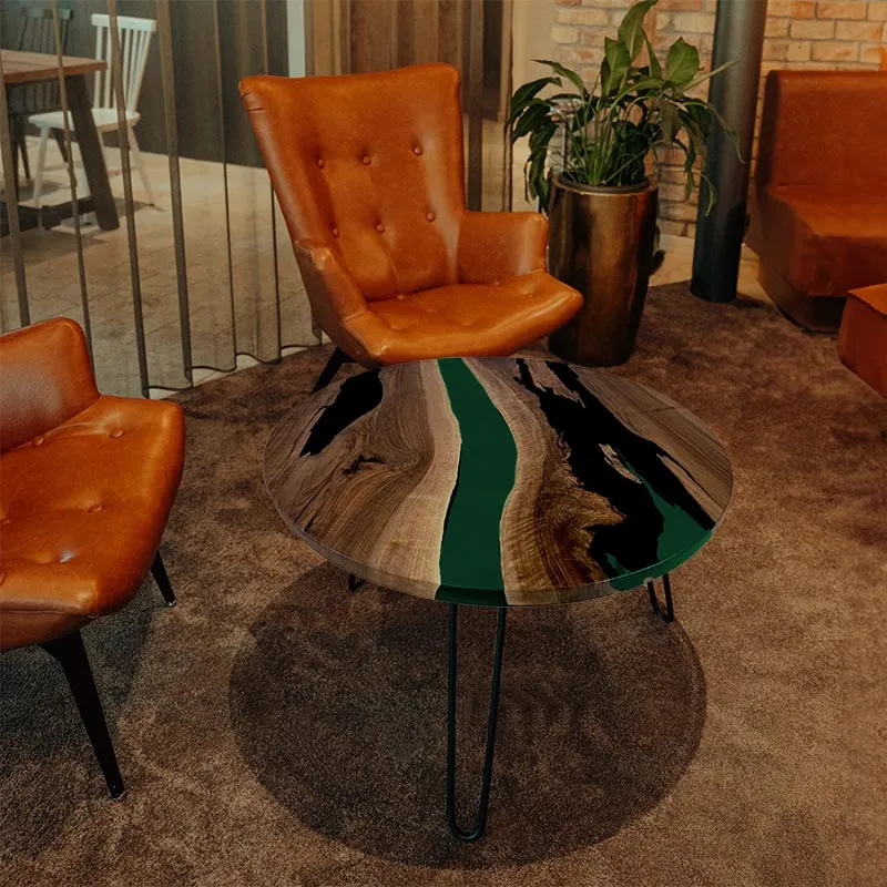 Couchtisch Nussbaum rund mit Epoxidharz smaragd-grün | Modell Gletschersee