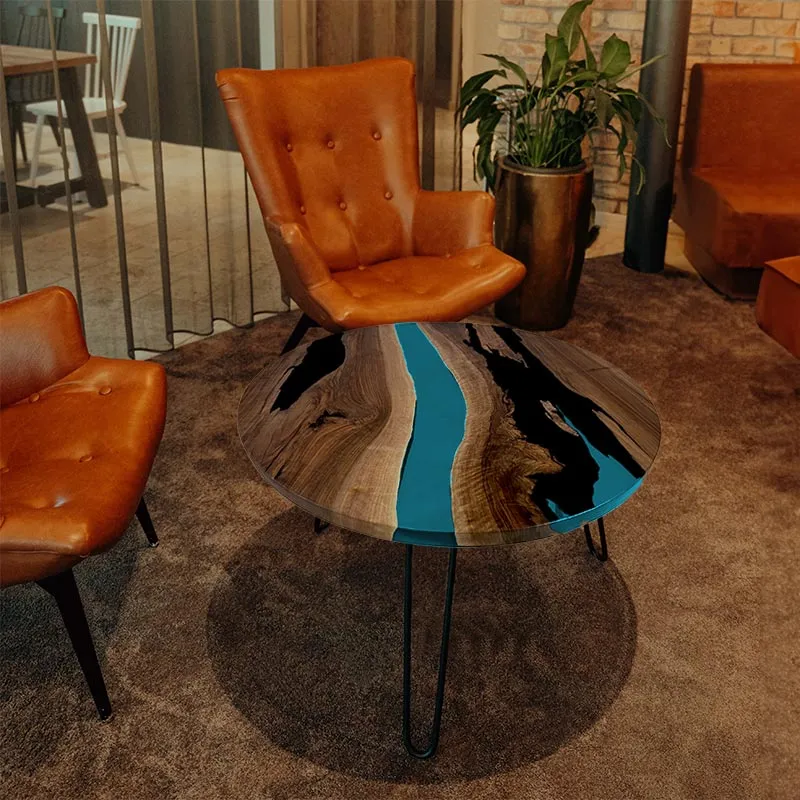 Couchtisch Nussbaum rund mit Epoxidharz türkis | Modell Gletschersee