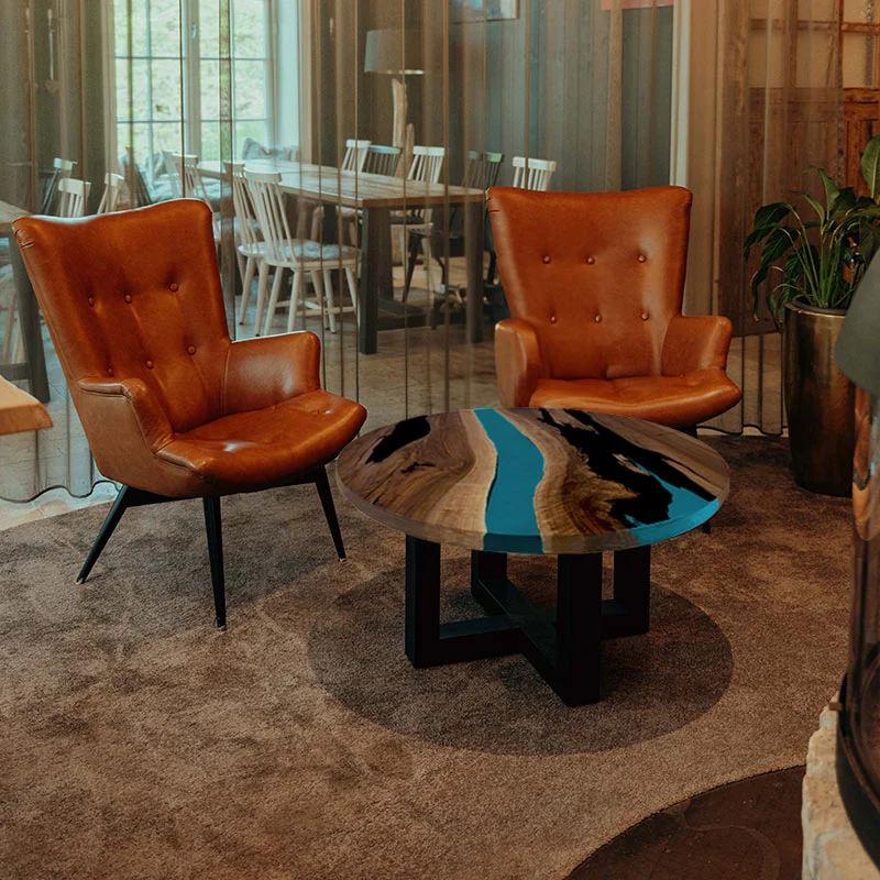 Couchtisch Nussbaum rund mit Epoxidharz türkis | Modell Gletschersee