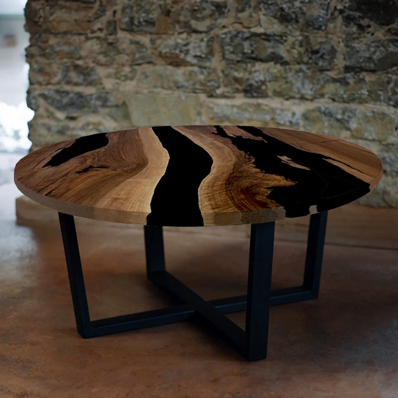 Couchtisch Nussbaum rund mit Epoxidharz schwarz | Modell Gletschersee